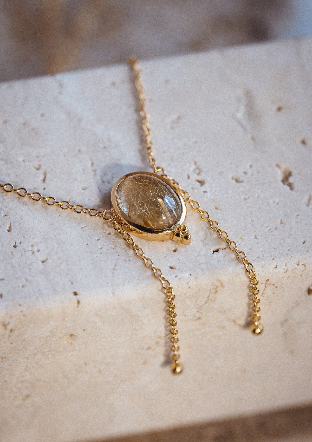 Collier Quartz Rutile Doré - Le Guide